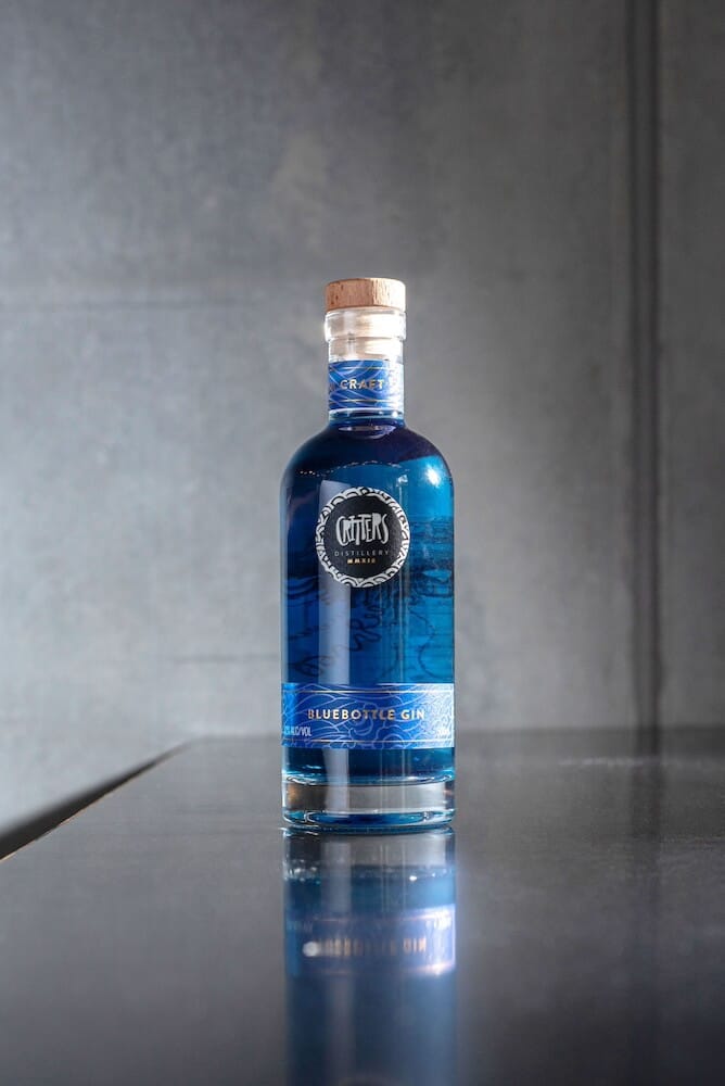 Critters Distillery Bluebottle Gin Critters Distillery Bluebottle Gin front on bench