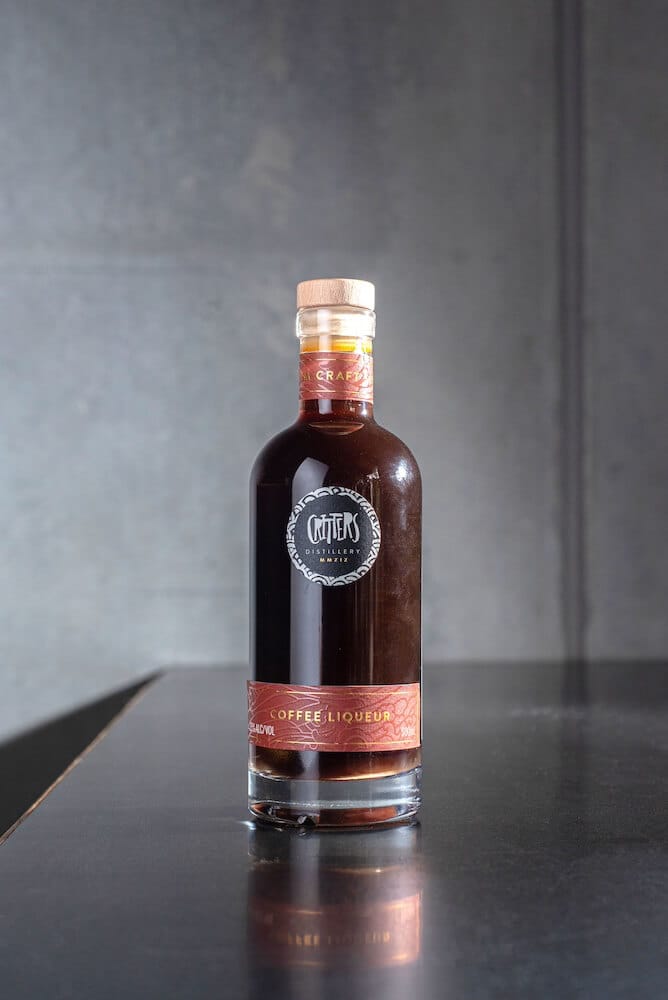 Critters Distillery Coffee Liqueur Critters Distillery Coffee Liqueur front on bench